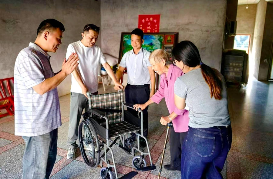 龙潭镇：轮椅撑起一片暖阳